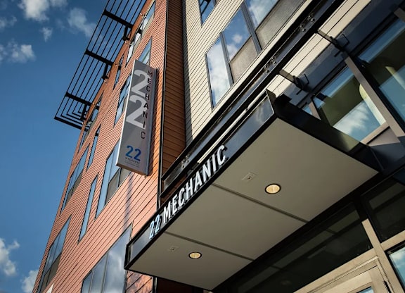 A building with a sign that reads "Mechanic" is shown.