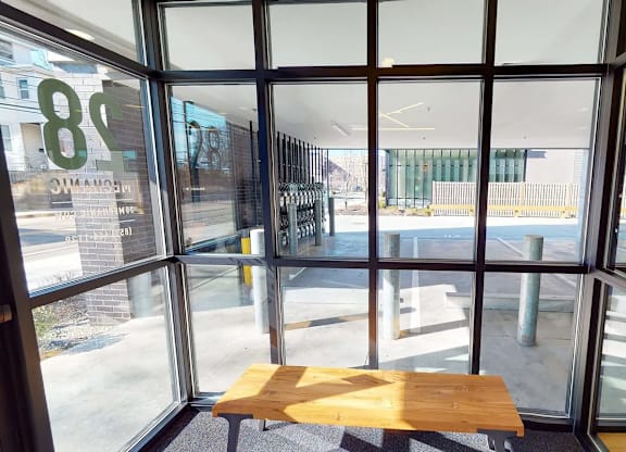 A view from inside a building looking out through a large window.