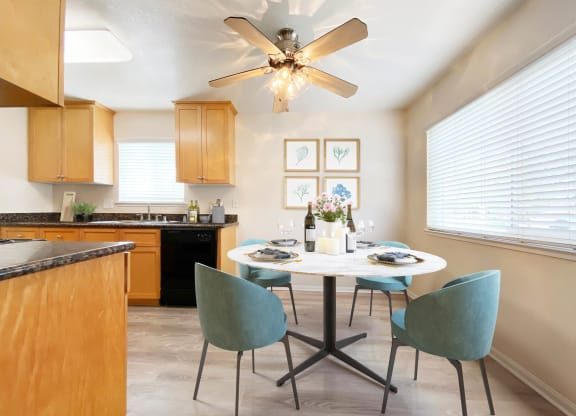a kitchen and dining room with a table and chairs  at Pleasanton Place, California, 94566