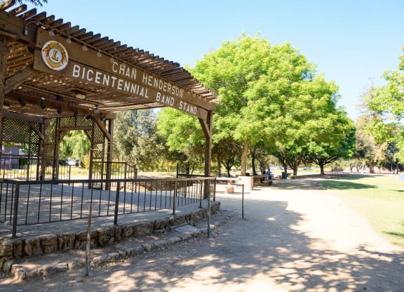 a sign for the bicentennial bin site in a park  at Pleasanton Place, Pleasanton, 94566