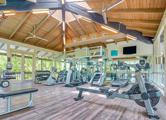 a gym with treadmills and other exercise equipment at the resort  at Rancho Los Feliz, Los Angeles, California