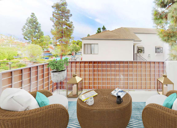 A spacious patio with outdoor lounge furniture at Sendero Huntington Beach, California, 92647