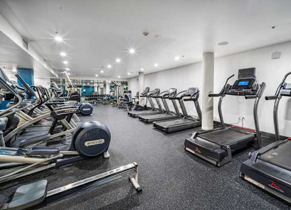 Cardio equipment in the fully-equipped gym  at Esprit Apartments, California