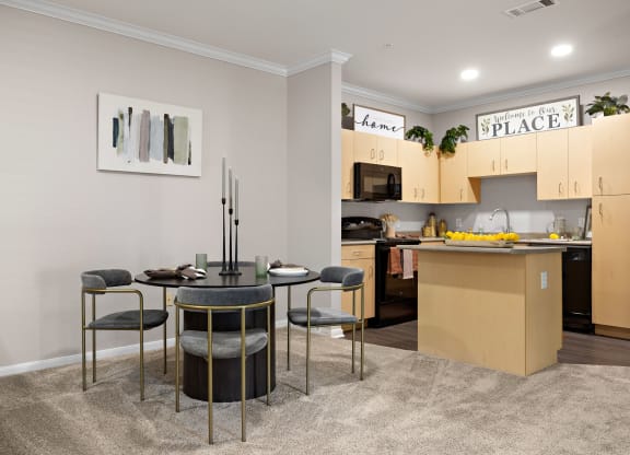 a kitchen and dining area at Artisan Apartments & Shops, Austin, Texas