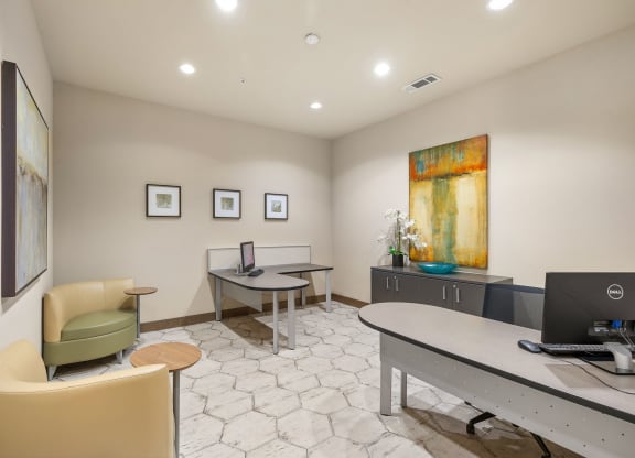 an office with a desk and chairs and a computer at Lakeline East Apartments, Texas