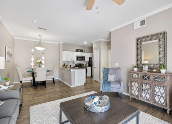 a living room with a couch and a table at Sonterra Apartment Homes, Austin, TX