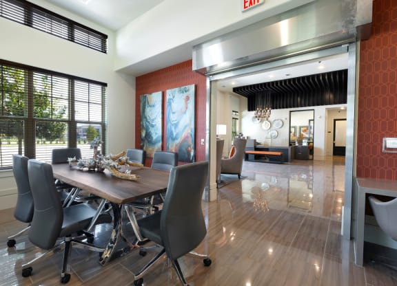 a dining room with a wooden table and chairs at North Creek, Texas, 78634