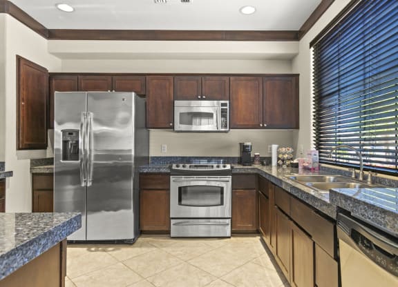 A large kitchen clubhouse ready for gatherings  at Adiamo Palm Valley, Arizona, 85395