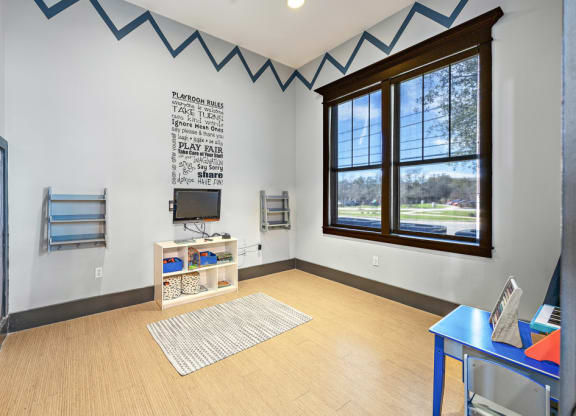 Living Area With TV at Las Brisas Apartment Homes, Round Rock, Texas