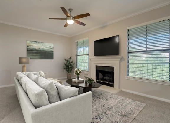 a living room with a couch and a tv at The Vista on Brodie, Austin, TX, 78745