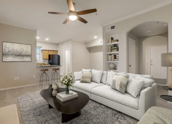 a living room with a couch and a coffee table  at The Vista on Brodie, Austin