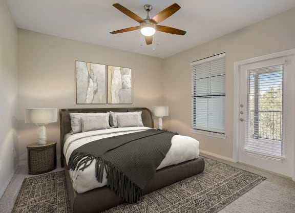 a bedroom with a bed and a ceiling fan at The Vista on Brodie, Texas, 78745
