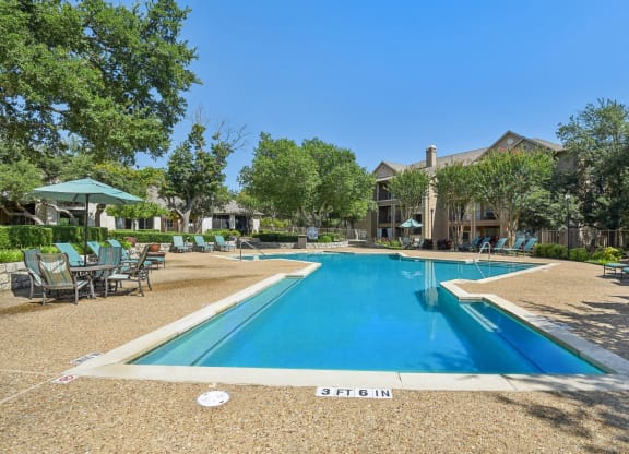 Pool With Relaxing Chairs at Sonterra Apartment Homes, Austin, TX, 78726