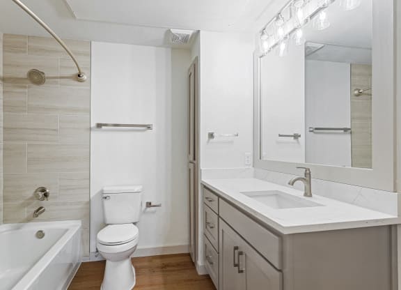 a bathroom with a sink toilet and a shower at The Legends at Eagle Mountain Lake, Fort Worth, TX