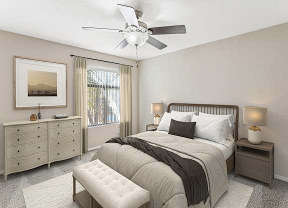 A bedroom with a large bed, a dresser, and a ceiling fan. at San Montego Apartments, Mesa, AZ