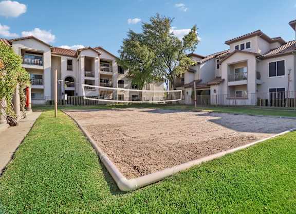 A large, sand volleyball court
