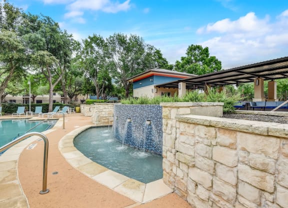pool and spa with water fountain at Artisan Apartments & Shops, Austin, TX