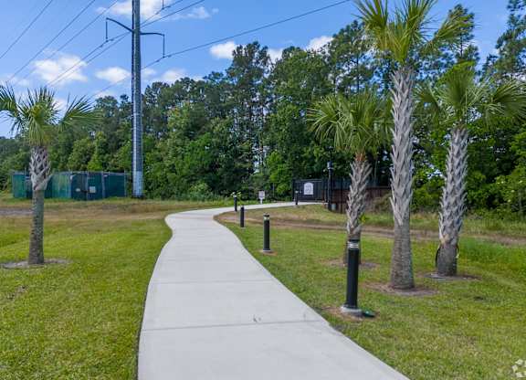 Concrete Walkway at The Oasis at Town Center Apartments, Jacksonville, Florida