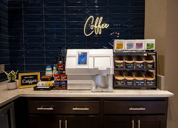 Gourmet coffee station with coffee and tea options and syrups at Level 25 at The Curve by Picerne, Las Vegas, NV, Nevada , 89148