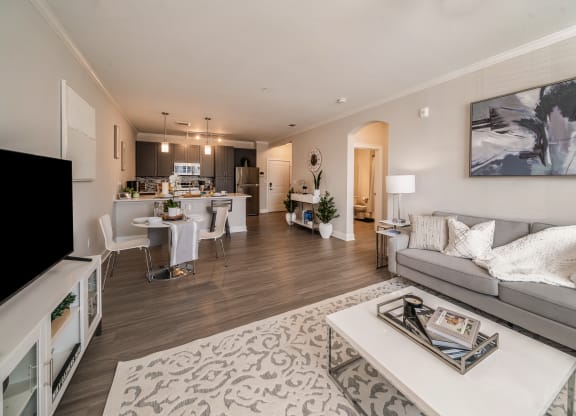 a living room with a couch and a table at The Oasis at Plymouth, Plymouth, MA, 02360
