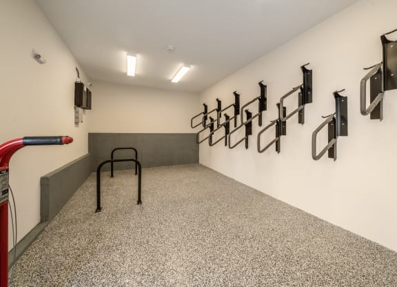 a room with a wall with a row of video monitors on the wall at The Oasis at Plymouth, Massachusetts, 02360