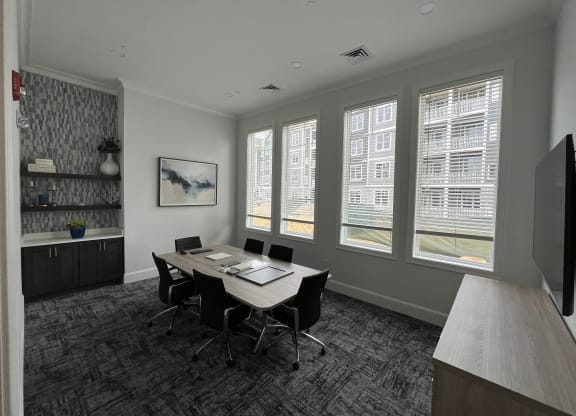 a room with a table and chairs and a wall of windows at Plymouth, Plymouth, MA, 02360