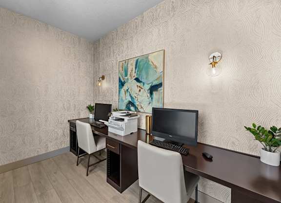 Community business center with computers and a printer