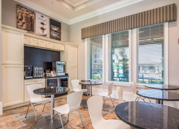 Clubhouse interior with dine and kitchen at The Oasis at Crosstown, Florida, 32807