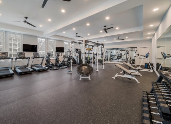 a gym with treadmills and other exercise equipment at The Oasis at Plymouth, Massachusetts