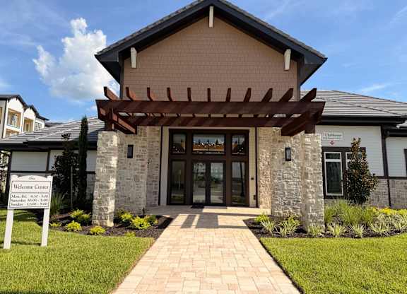 A building with a sign that says Welcome Center.