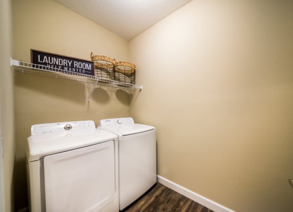 our apartments have a spacious laundry room with a washer and dryer at The Oasis at Highwoods Preserve, Tampa