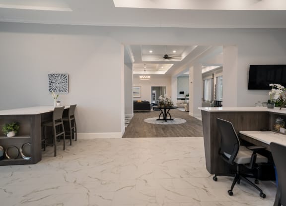 a view of a living room and a dining room with a table and chairs at The Oasis at Plymouth, Massachusetts, 02360