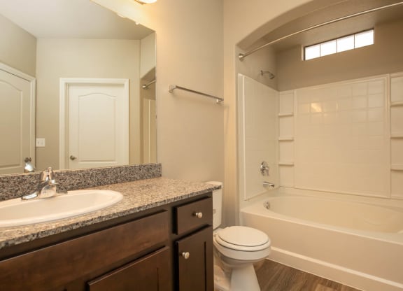 Bathroom area with wooden cabinet at The Cantera by Picerne, Nevada, 89139