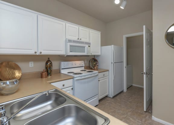 Kitchen area with cabinets area at The Covington by Picerne, Las Vegas, NV, 89139