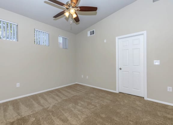 Room with ceiling fan and light at The Covington by Picerne, Las Vegas, NV