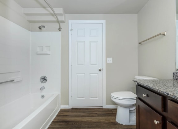 Toilet and bath tub at The Covington by Picerne, Las Vegas, NV