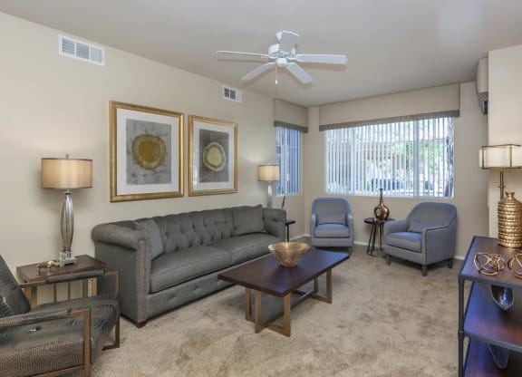 Living room couch at The Covington by Picerne, Nevada, 89139