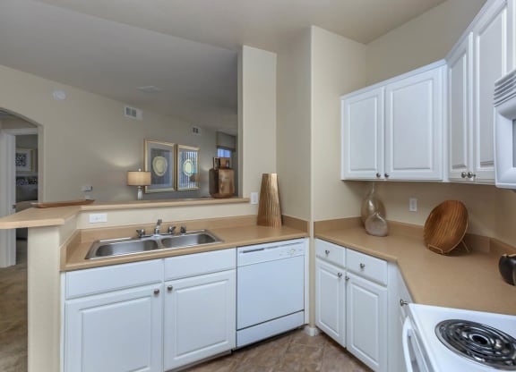 White kitchen interior at The Covington by Picerne, Nevada, 89139