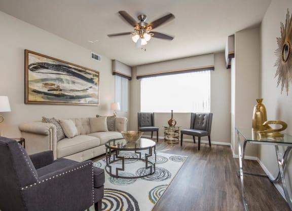 Living room with frame and lamps at The Fairways by Picerne, Las Vegas, Nevada