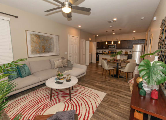 Living room with ceiling  fan at Level 25 at Cactus by Picerne, Las Vegas, NV