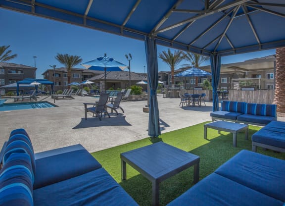 pool side seating at Level 25 at Oquendo by Picerne, Las Vegas, 89148