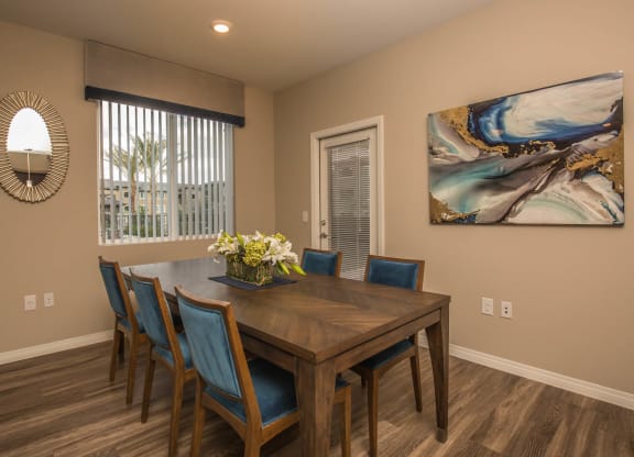 Wooden Dining table at Level 25 at Oquendo by Picerne, Las Vegas, Nevada