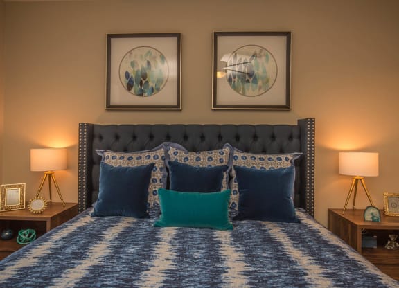 Bedroom with beautiful lamp at Level 25 at Oquendo by Picerne, Las Vegas, NV, 89148