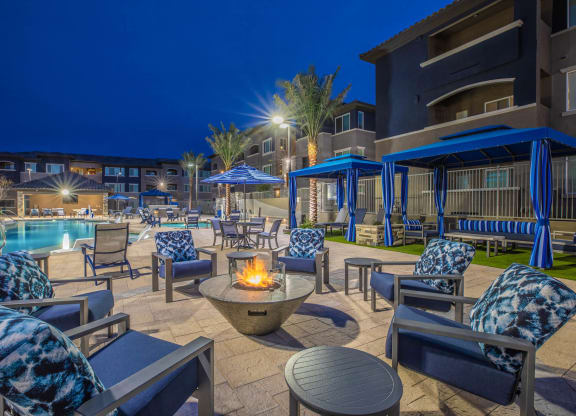 Pool side seating with fire place at Level 25 at Sunset by Picerne, Nevada