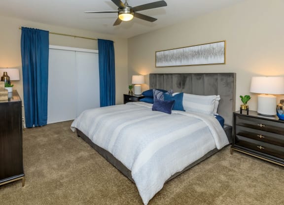 Bedroom with bed and ceiling fan at Level 25 at Sunset by Picerne, Nevada