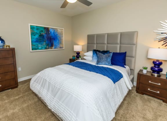 Bedroom with lamps and frames at Level 25 at Sunset by Picerne, Las Vegas, 89113