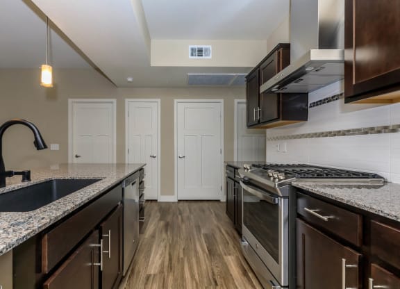 Kitchen appliances and cabinets at Level 25 at Sunset by Picerne, Nevada, 89113