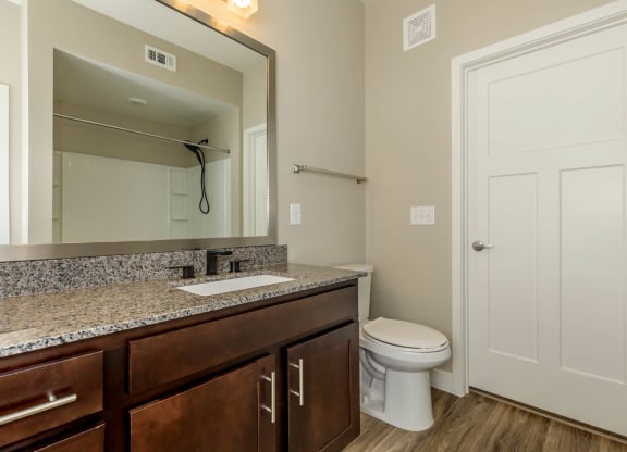 Bath with wooden floor at Level 25 at Sunset by Picerne, Nevada, 89113