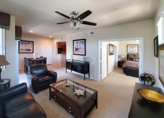 Living Room With Ceiling Fan at The Paramount by Picerne, Nevada