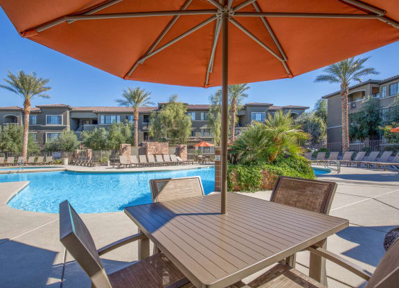 Poolside Dining Table at The Passage Apartments by Picerne, Henderson, NV